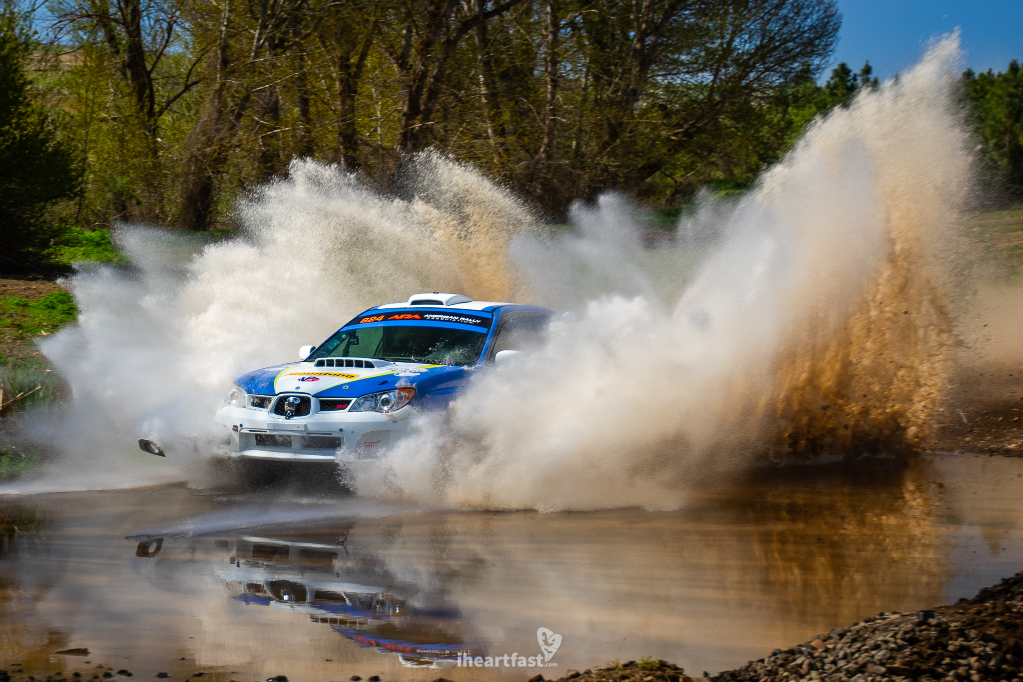 Cameron Steeley loses a foglight cover as they go through the water crossing